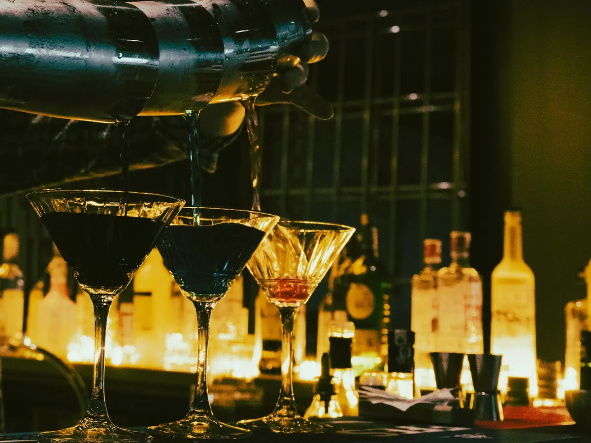 Cocktails being poured at the Gyoza Bar counter
